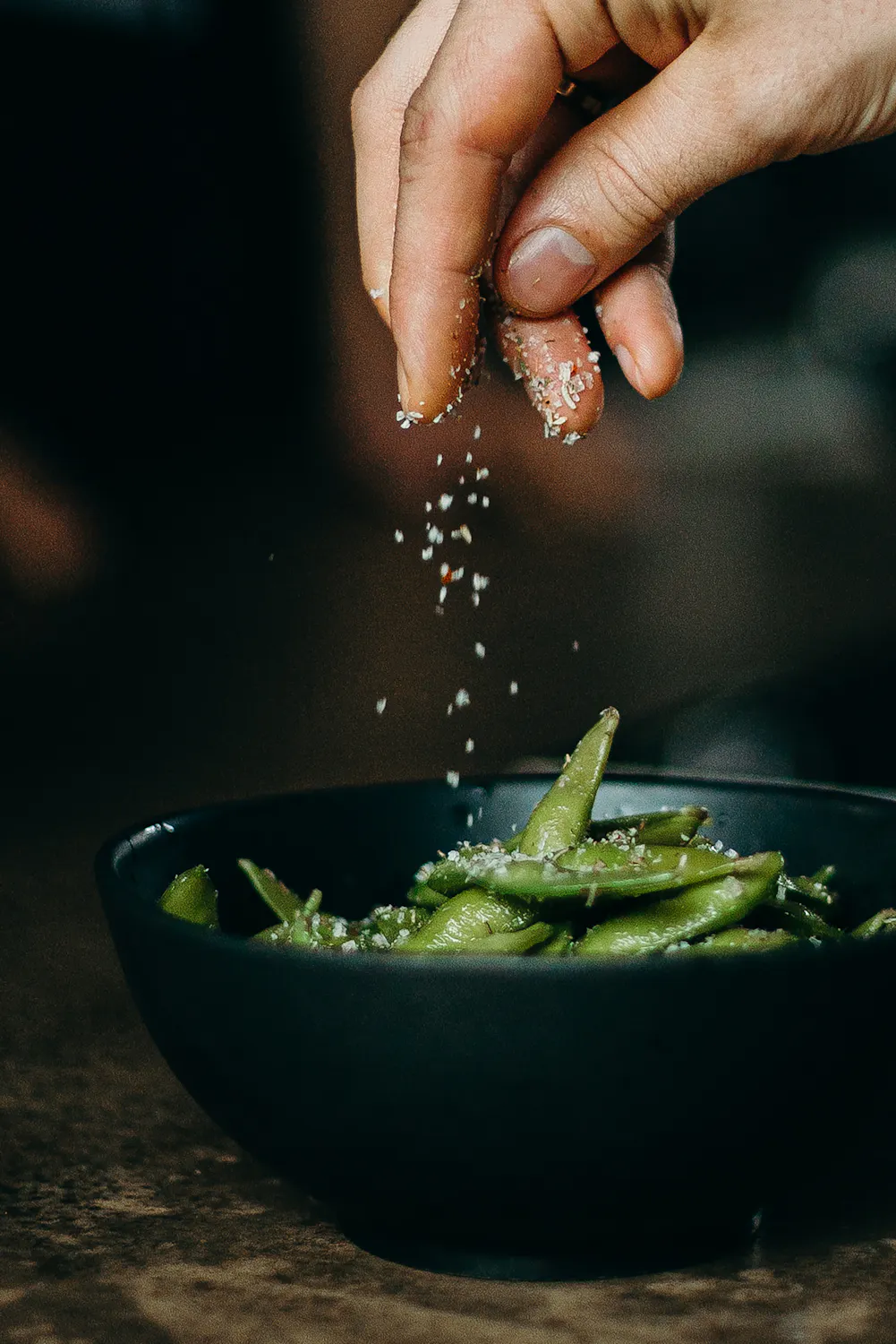 Chef preparing fresh pasta in restaurant kitchen