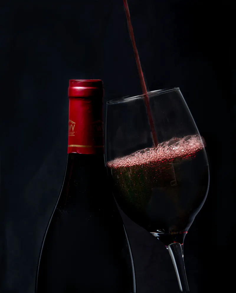 Red wine being poured into a glass